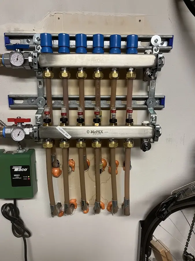 Plumber performing Leak Detection at a residential property in Genoa